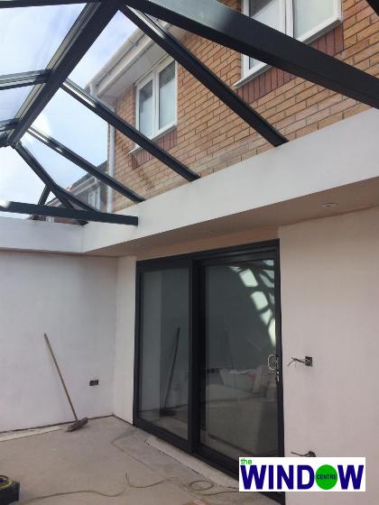 Progress Picture of a fantastic orangery roof and sliding patio door