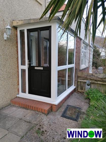 White uPVC Porch with a Black uPVC Door